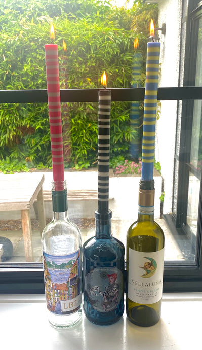 Re-use your old bottles as funky candle holders
