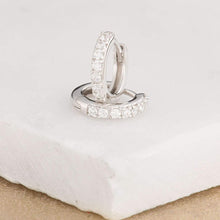 Load image into Gallery viewer, Silver Huggie Hoops with clear stones