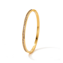 Load image into Gallery viewer, Cubic Zirconia Inset Gold Bangle
