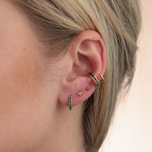Load image into Gallery viewer, Scream Pretty Huggie Hoops with green stones
