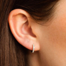 Load image into Gallery viewer, Silver Huggie Hoops with clear stones
