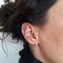 Load image into Gallery viewer, Bullet Huggie Earrings With Clear Stones (gold plated)
